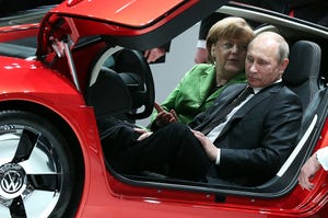 Putin and Merkel (Getty)