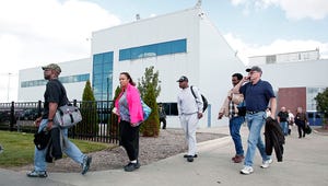 UAW members leaving Warren truck plant (Getty)