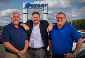 Ricart Credit Factoryrsquos Tony Davis right with Rick Ricart center and colleague Herb Pranti