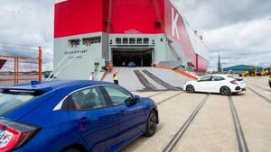 USbound Honda Civic hatchbacks loaded onto cargo ship at Southampton UK