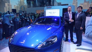 Aston Martinrsquos Palmer and LeTVrsquos Jia with Rapide S at CES in January