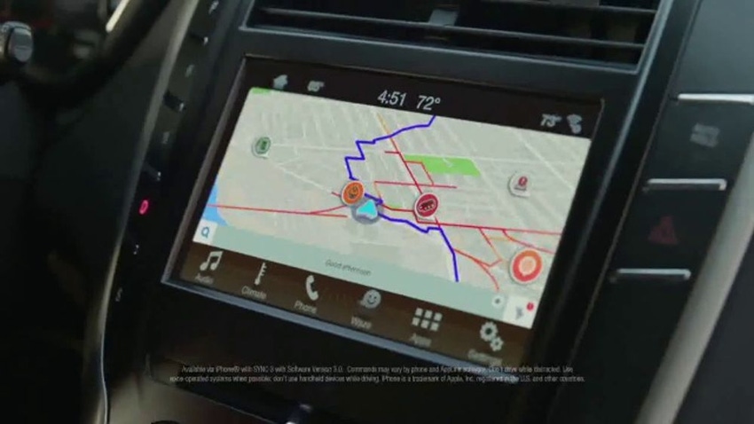 Top-ranked ad for Lincoln MKC highlights Waze navigation feature.