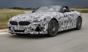 Fabric hardtop of ʼ19 BMW Z4, shown in camouflage, closes in 10 seconds at up to 31 mph.