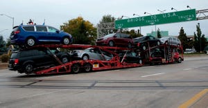 Car hauler at Ontario-Michigan border (Getty)
