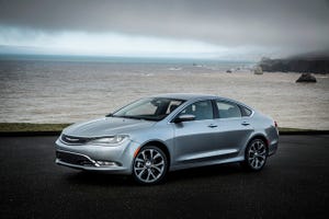 3915 Chrysler 200 has dramatic character lines accenting its coupelike profile