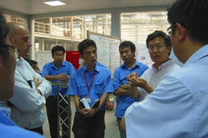 Zhou instructs engineers at Getrag Jiangxi transmission plant in Nanchang China