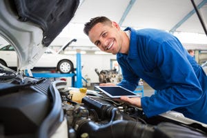 auto mechanic smiling