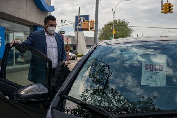 Dealership with masked guy (NY Times)