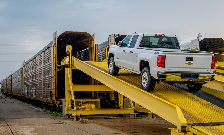 Chevrolet Silverado pickup at GM plant in Fort Wayne IN loaded on train car for shipping to dealership