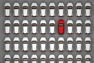 red car among white cars (2)