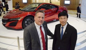 Honda chief engineers Ted Klaus and Yashuhide Sakamoto with Acura NSX
