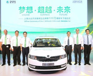 Shanghai Volkswagen officials flank 1 millionth Chinabuilt Skoda