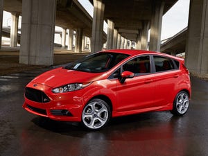 Fiesta ST boasts 17in alloy wheels black headlamp and foglamp bezels and a black mesh grille with ST badge
