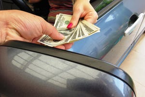 Cash for car (Getty)