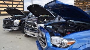 Engines in new Nissan Titan XD from left Ram 1500 EcoDiesel and Toyota Tacoma being tested by WardsAuto editors