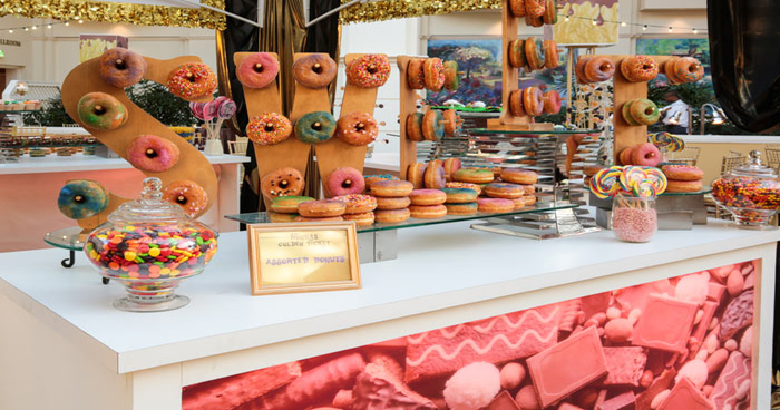 a Doughnut Wall Twist, Hanging Lobster Traps, a Produce Photo Backdrop