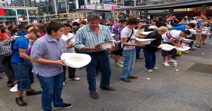 Stampede Flaunts Calgary Hospitality With White Hat Stunt in Dundas Square