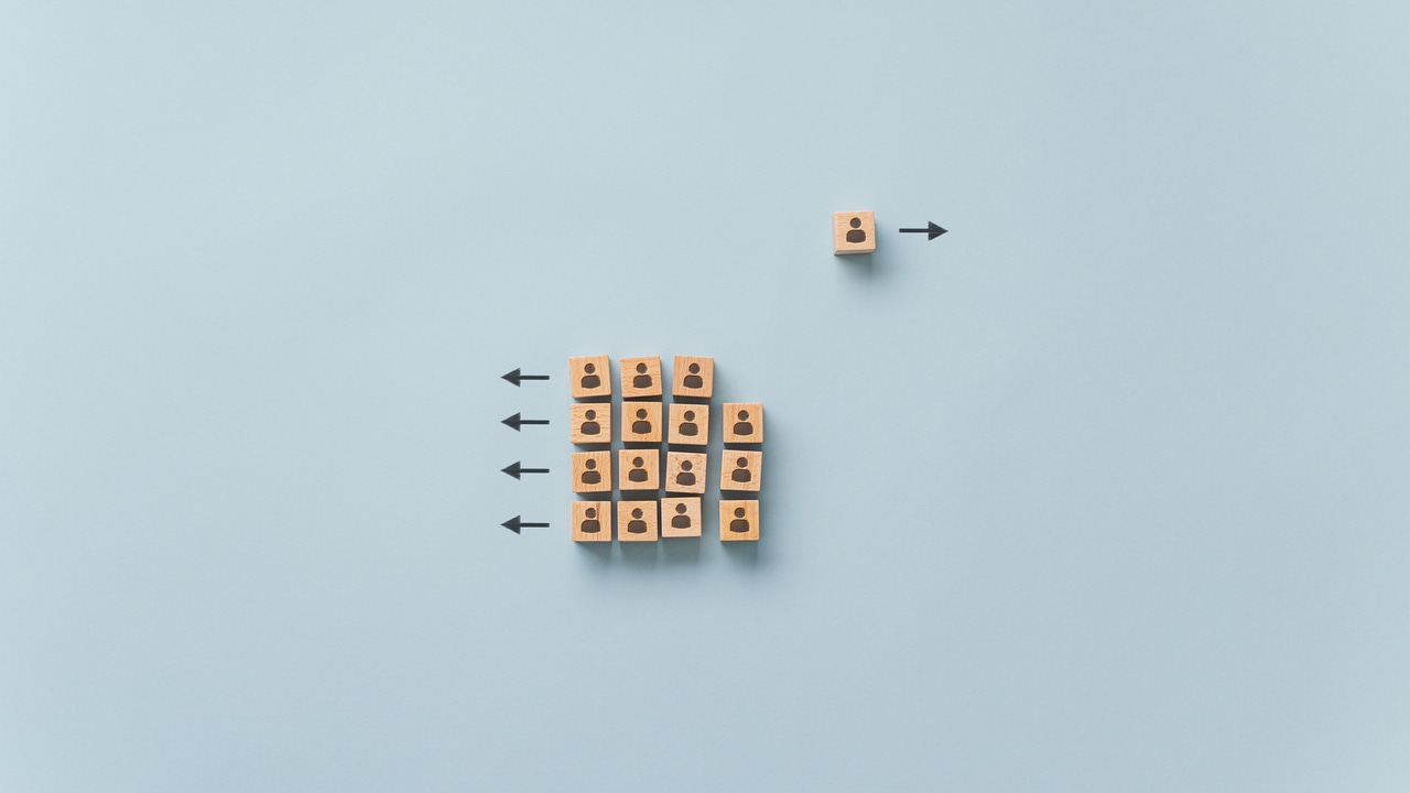 Wooden block with people icons Wooden block with people icons