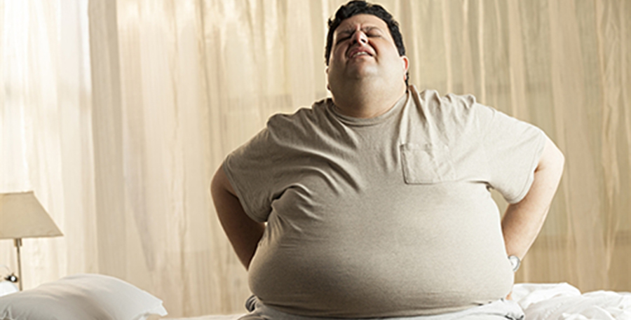 Does being obese cause back problems?
