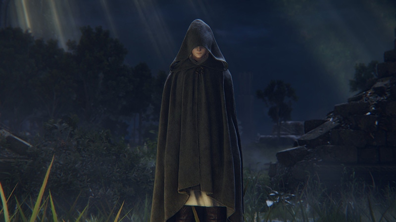 A hooded young woman stares at the player character in Elden Ring.
