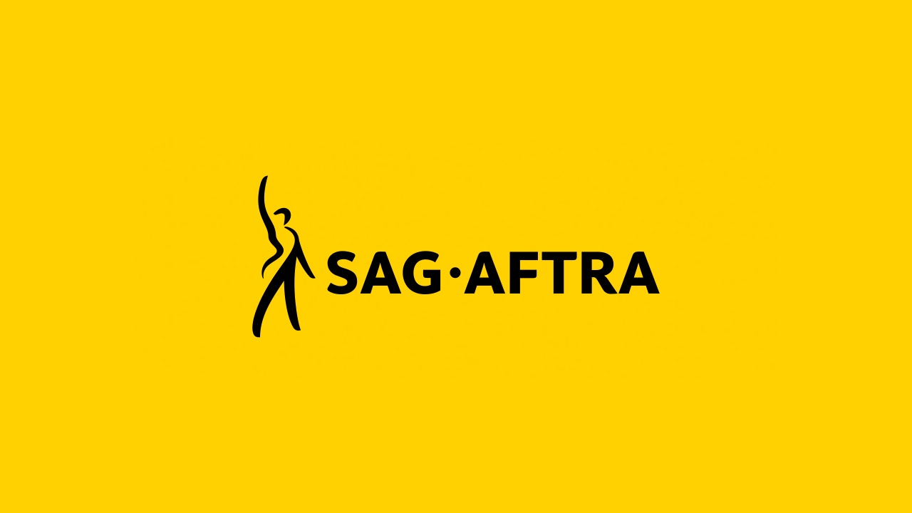 The SAG-AFTRA logo on a yellow background The SAG-AFTRA logo on a yellow background