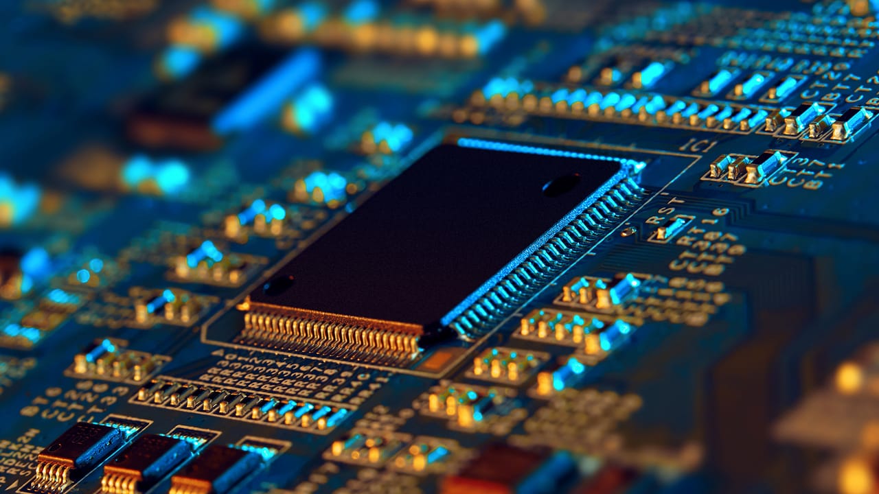 A photo of a computer memory chip. A photo of a computer memory chip.