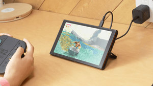 The Nintendo Switch 2 resting on a tabletop in handheld mode running Donkey Kong Bananza The Nintendo Switch 2 resting on a tabletop in handheld mode running Donkey Kong Bananza