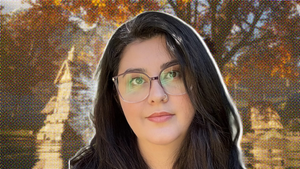 A photograph of Kim Swift in front of a pixelated screenshot of Hawthorn. A photograph of Kim Swift in front of a pixelated screenshot of Hawthorn.