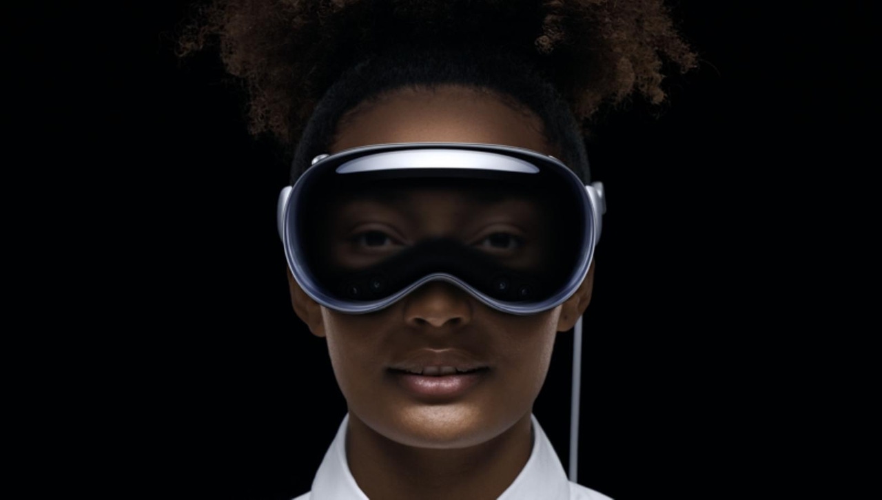 A woman wears an Apple Vision Pro. A woman wears an Apple Vision Pro.