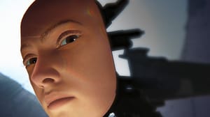 A human face on a robot limb. A human face on a robot limb.