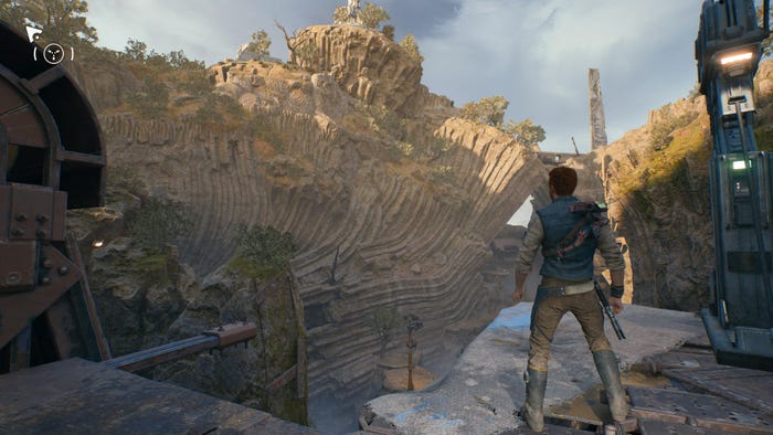 A screenshot from Star Wars Jedi: Survivor. The player looks out at a carved rock wall.