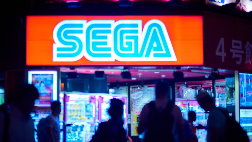 A neon Sega sign outside an arcade in Japan