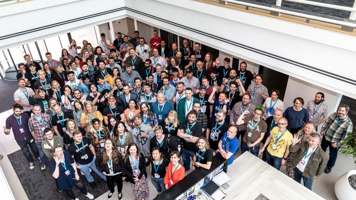 A group photo of nDreams employees taken from above.