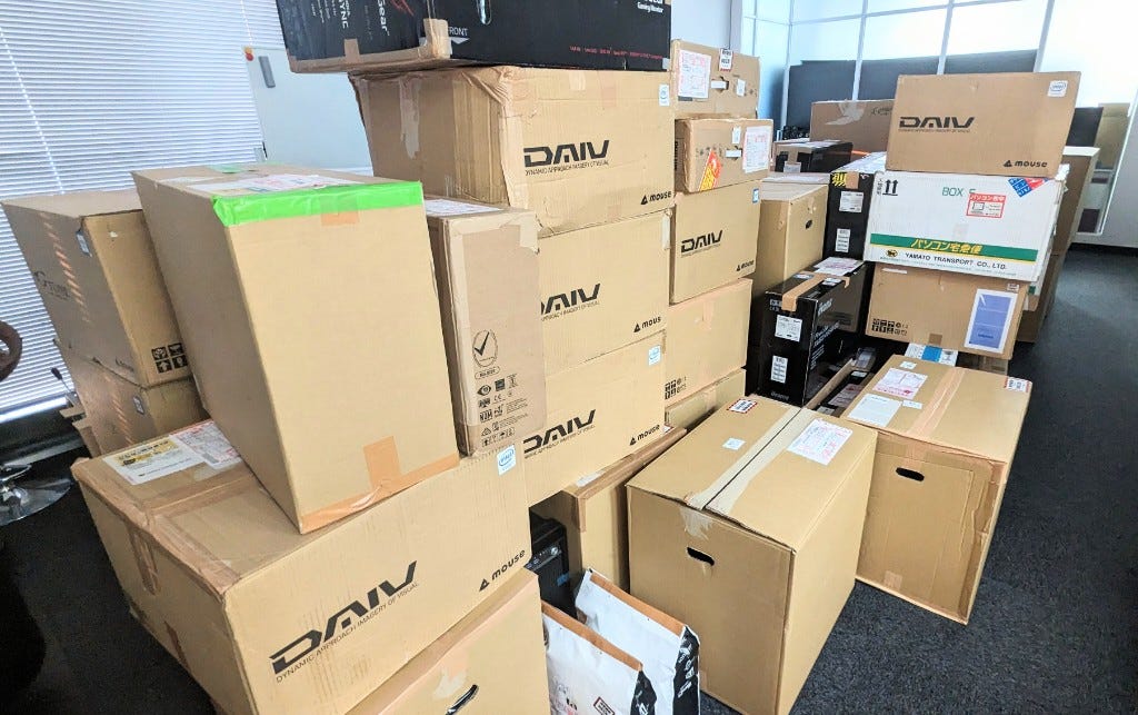 Boxes filled with Tango Gamesworks work machines Boxes filled with Tango Gamesworks work machines