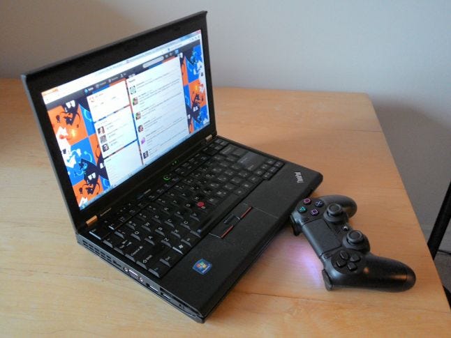 Laptop and a PS4 Controller