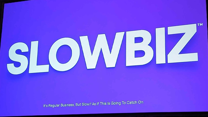 The word 'slowbiz' in bold on a purple background