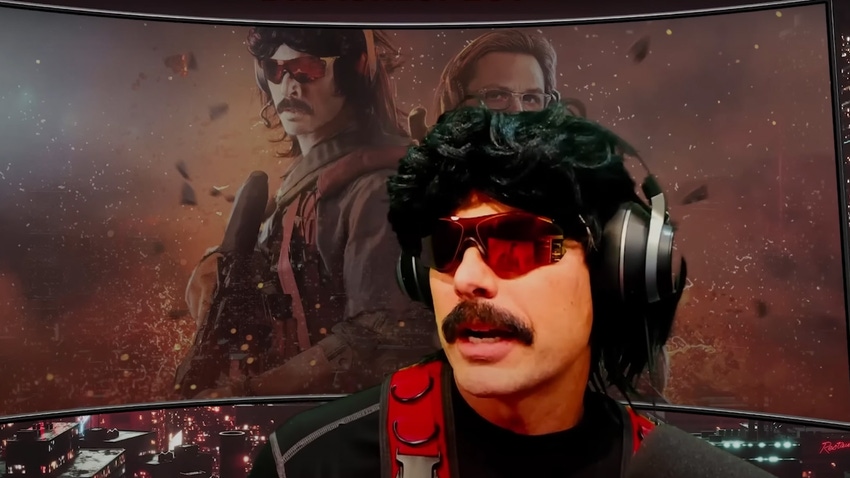 A screencap of YouTuber Dr Disrespect. He wears red wraparound sunglasses and a fake mullet and moustache.