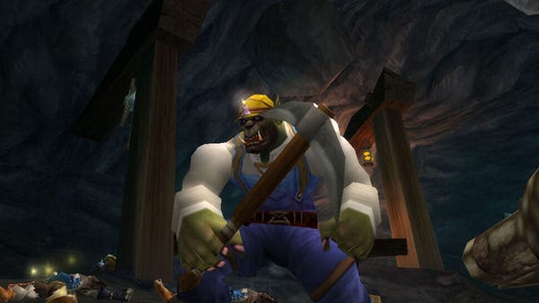 A World of Warcraft orc in a mining outfit