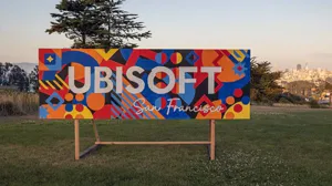 A colorful sign with the Ubisoft logo A colorful sign with the Ubisoft logo