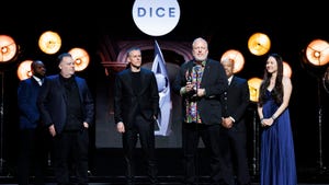 Rod Fergusson and several Diablo IV developers onstage accepting their DICE 2024 award.