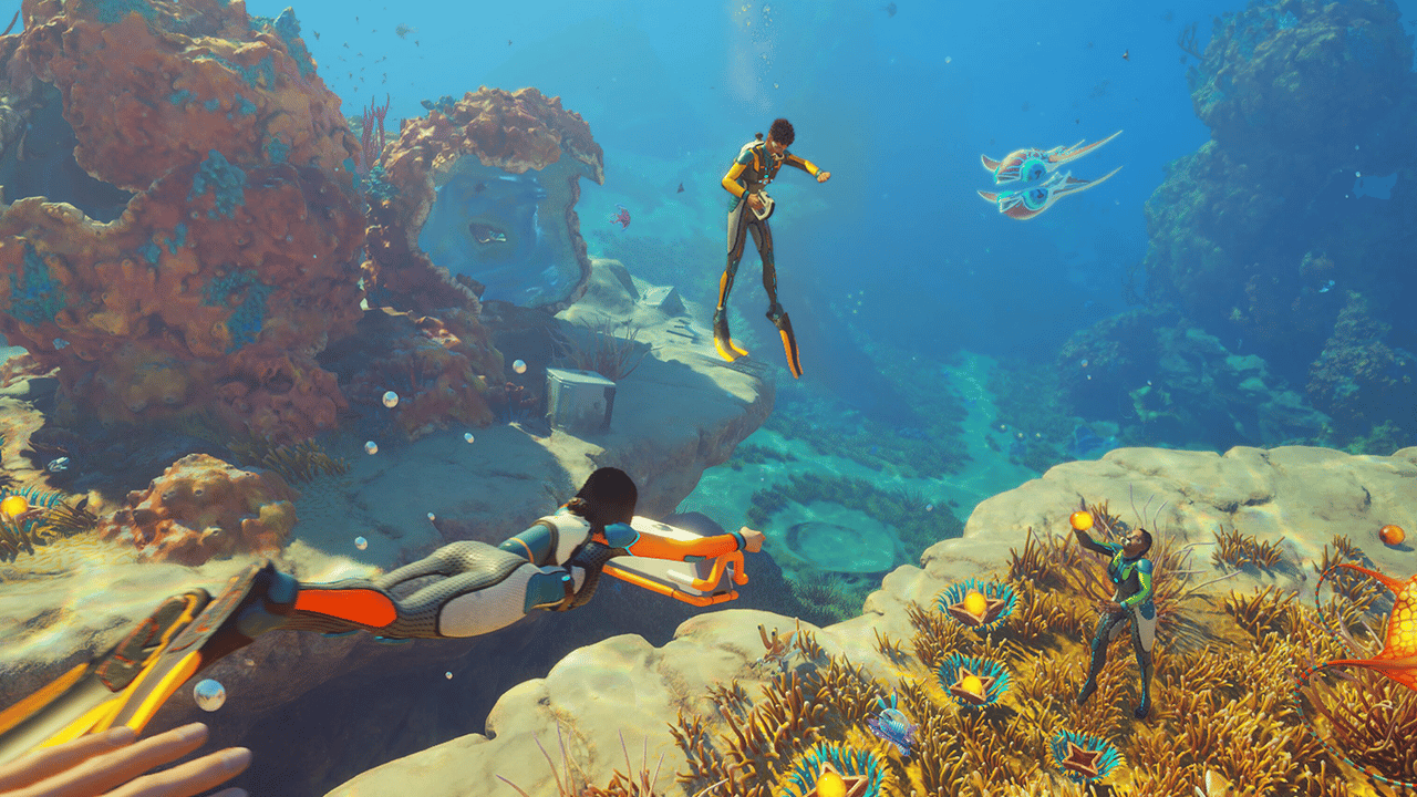 A screenshot of three players exploring the shallows in Subnautica 2 A screenshot of three players exploring the shallows in Subnautica 2