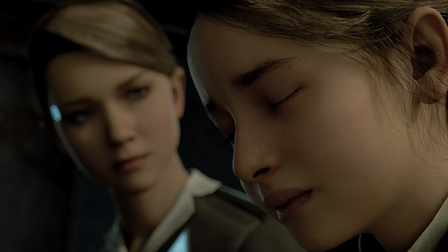 The android Kara looks at a little girl in Quantic Dream.