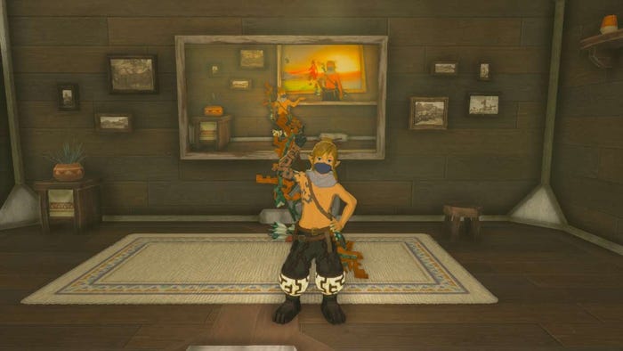 Link from The Legend of Zelda: Tears of the Kingdom points up at a photo of himself pointing at a photo of himself pointing at a photo of himself.