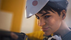 A player character from Embark Studios smiles at the camera. She is holding a gun.
