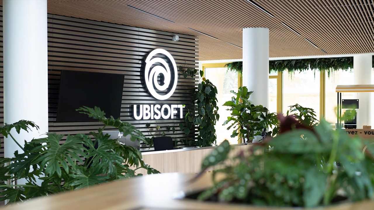 A photograph of the Ubisoft logo inside a company office A photograph of the Ubisoft logo inside a company office