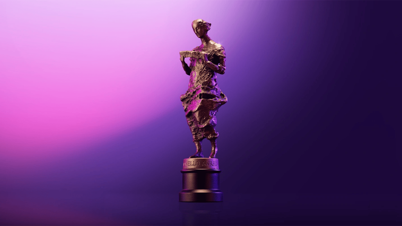 An Ivors statuette on a purple and pink background An Ivors statuette on a purple and pink background