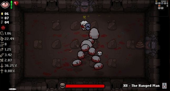 Binding of Isaac; two floating bloody worms dash in front of a crying baby in a dark cave