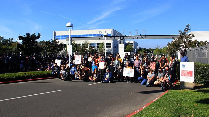 Blizzard employees gather in front of company headquarters. Blizzard employees gather in front of company headquarters.