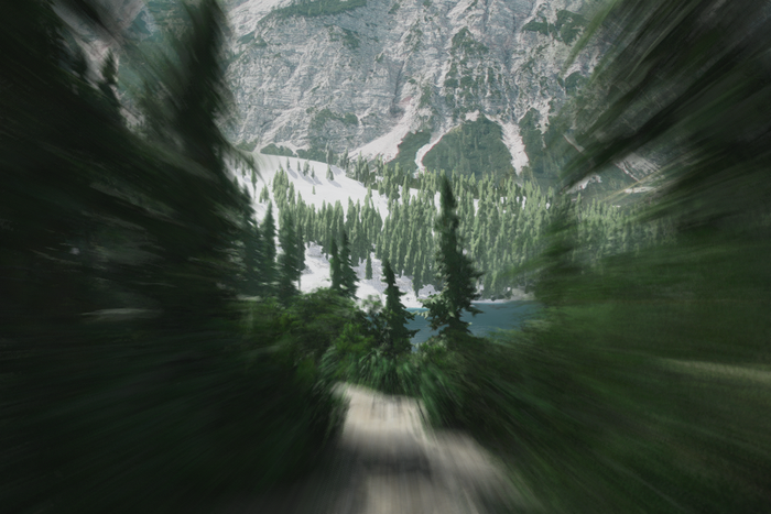 A long exposure photography shot of a wintery forest. A long exposure photography shot of a wintery forest.