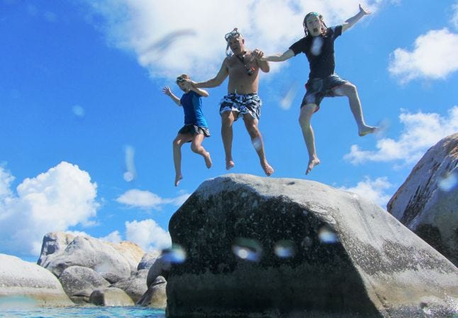 Jumping off a rock together